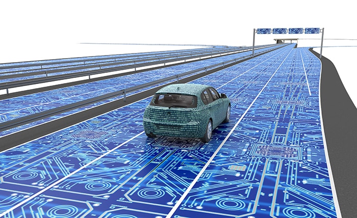 digital car driving on a circuit-board style highway